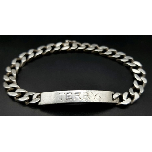 877 - A vintage Solid Silver 925 Identity Bracelet, 33.3 grams, 22.5cm, inscribed with the name 