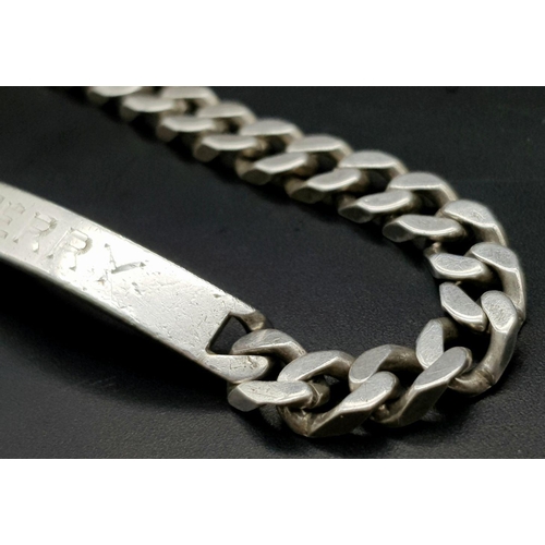 877 - A vintage Solid Silver 925 Identity Bracelet, 33.3 grams, 22.5cm, inscribed with the name 