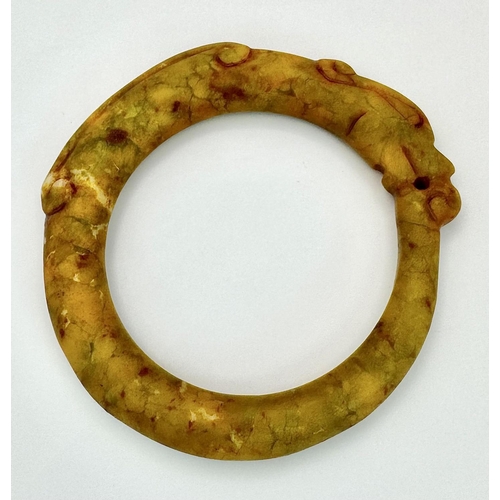 160 - A vintage, archaic style, Chinese jade bangle/oversized amulet in the archaic design of the “OUROBOR... 