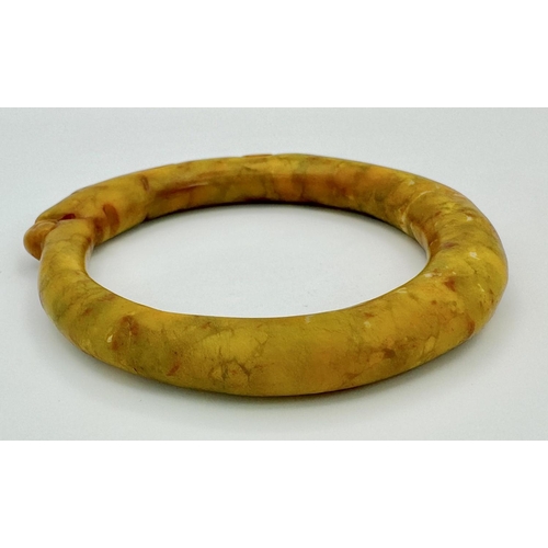 160 - A vintage, archaic style, Chinese jade bangle/oversized amulet in the archaic design of the “OUROBOR... 