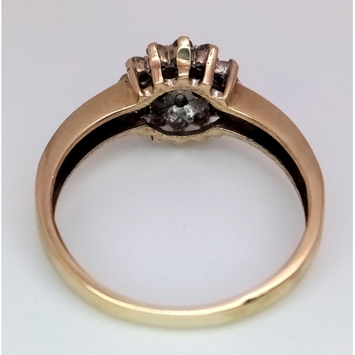 965 - A 9K YELLOW GOLD DIAMOND CLUSTER RING. 0.25CT. 2.2G IN WEIGHT. SIZE L 1/2. Ref: SC 5011.