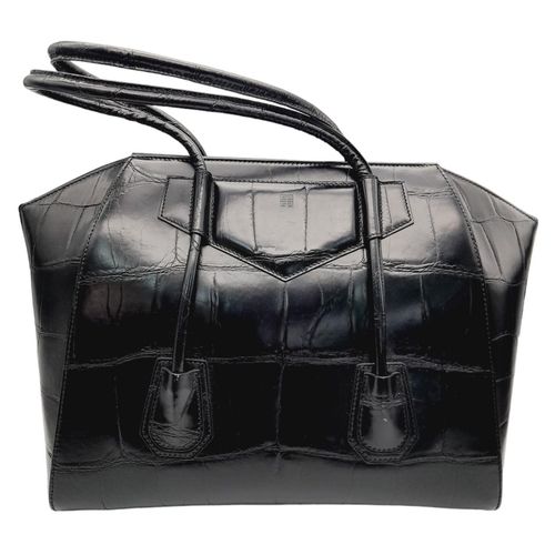 347 - A Givenchy Antigona Hand/Shoulder bag. Croc embossed black leather exterior and silver tone lock dec... 