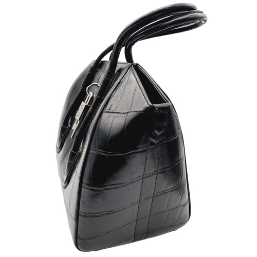 347 - A Givenchy Antigona Hand/Shoulder bag. Croc embossed black leather exterior and silver tone lock dec... 