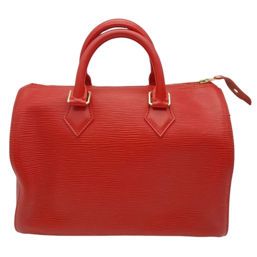 438 - A Louis Vuitton Red Speedy Bag. Epi leather exterior with gold-toned hardware, two rolled leather ha... 