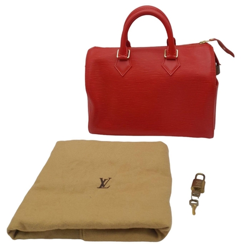 438 - A Louis Vuitton Red Speedy Bag. Epi leather exterior with gold-toned hardware, two rolled leather ha... 