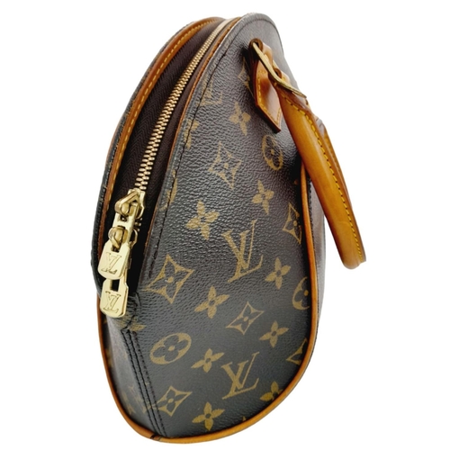 234 - A Louis Vuitton Ellipse Handbag. Monogram canvas exterior with leather trim, two rolled leather hand... 