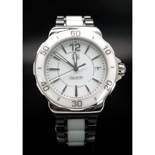 277 - A Tag Heuer Formula 1 Quartz Ladies Watch. Ceramic and steel bracelet and case - 35mm. White dial. N... 