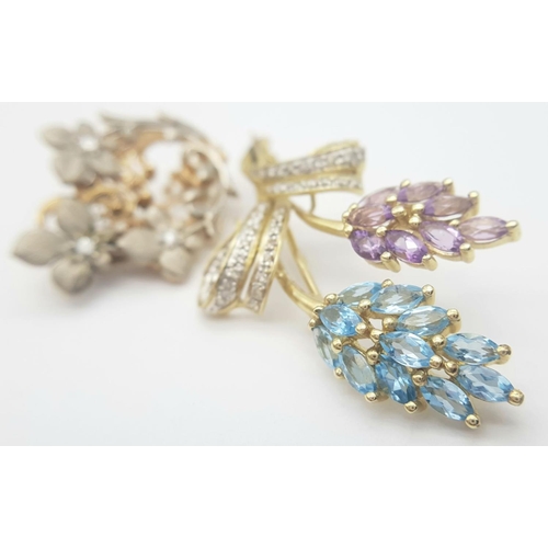 403 - Two 14K Gold Vintage Gemstone Set Brooches. A diamond floral brooch - 3x 2cm and a diamond, amethyst... 