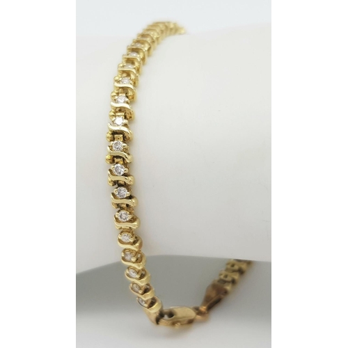 192 - A 9K Yellow Gold Diamond Tennis Bracelet. 50 small round cut diamonds. 18cm. 8.6g total weight. Ref:... 