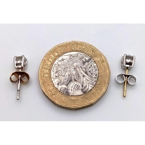 1124 - Withdrawn - A Pair of 18K Gold Diamond Stud Earrings. 0.50ctw. 1.1g total weight. Ref: 018140