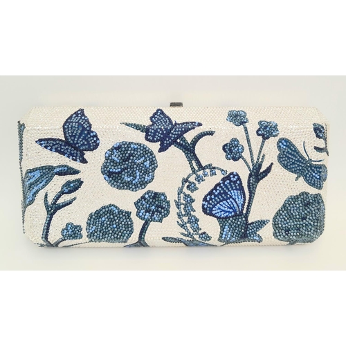 1138 - A Judith Leiber Blue Garden Clutch Bag. Crystal embellished exterior with clasp fastening closure. S... 