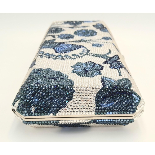 1138 - A Judith Leiber Blue Garden Clutch Bag. Crystal embellished exterior with clasp fastening closure. S... 