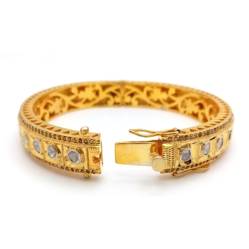 104 - An amazing, vintage, silver and gold bangle with old cut diamonds (totalling over 10.5 carats), inte... 