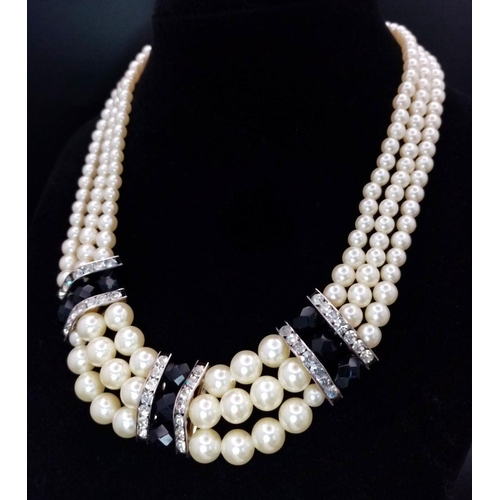 202 - A vintage and very glamorous PIERRE CARDIN three strand faux graduating white pearl chocker necklace... 