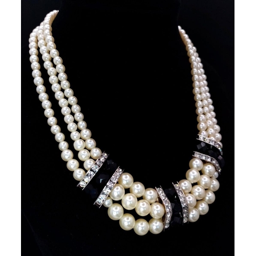 202 - A vintage and very glamorous PIERRE CARDIN three strand faux graduating white pearl chocker necklace... 