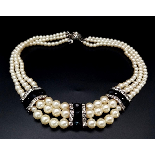 202 - A vintage and very glamorous PIERRE CARDIN three strand faux graduating white pearl chocker necklace... 