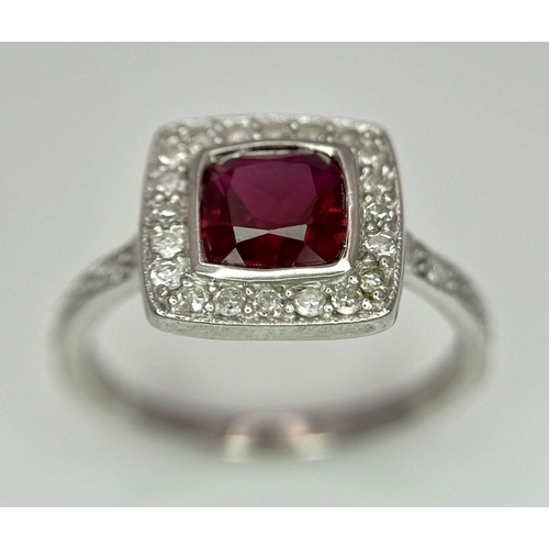 253 - A 9K White Gold (tested as) Diamond and Red Stone Ring, 2.5g total weight, 0.28ct diamond weight, si... 