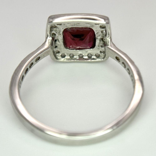 253 - A 9K White Gold (tested as) Diamond and Red Stone Ring, 2.5g total weight, 0.28ct diamond weight, si... 