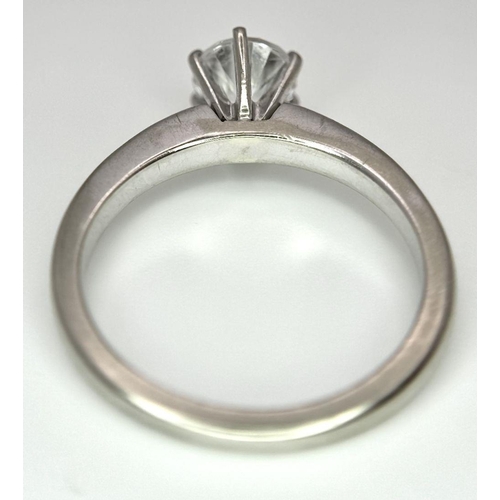 267 - A 14K White Gold CZ Solitaire Ring. 4g total weight. Size O.
SH1590I.