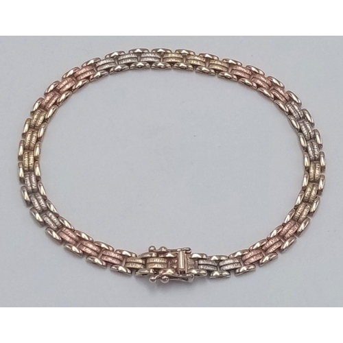 9 - A 9K Gold Three-Tone Intertwined Bracelet - 8.1g total weight. 20cm length. JM05