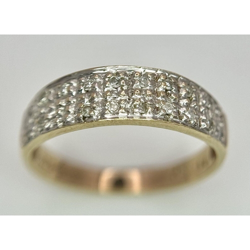 544 - A 9K YELLOW GOLD DIAMOND SET BAND RING - 2.1G. SIZE L. REF: SPAS 5007.