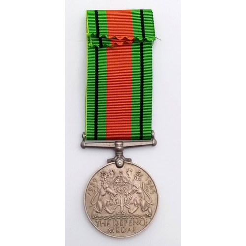 615 - WW2 British Defence Medal with a Silver Royal Navy Patrol Pin. The pin was normally given to British... 