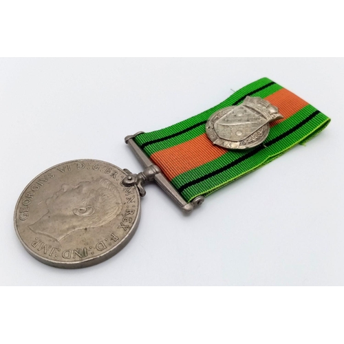 615 - WW2 British Defence Medal with a Silver Royal Navy Patrol Pin. The pin was normally given to British... 