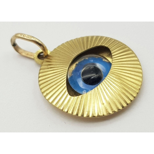 755 - A 9K YELLOW GOLD EVIL EYE PENDANT. 1.6G IN WEIGHT. 1.5CM IN DIAMETER. Ref: SC 5061.