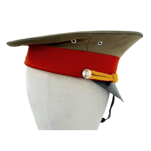 763 - Vietnam War Era Enlisted Mans NVA Visor Cap. Complete with badge and chin strap.