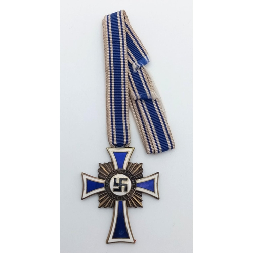 875 - 1st Pattern (no date) Bronze Grade Mothers Cross. The bronze issue  was awarded to German mothers wi... 