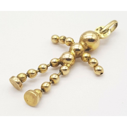 958 - A 9K YELLOW GOLD ARTICULATED BALL BEADED PERSON 1.7G. Ref: SC 5012.