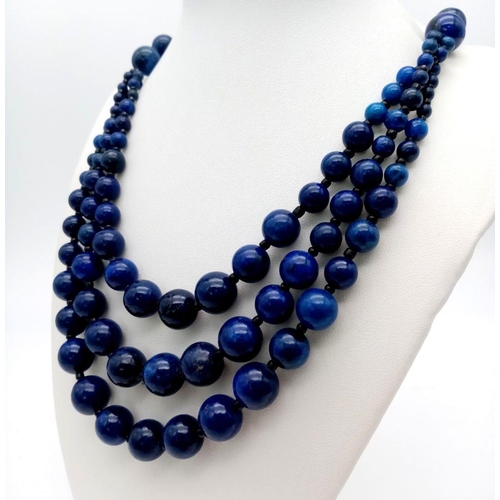 195 - A vintage, three strand necklace and bracelet set with round lapis lazuli beads of graduating size. ... 