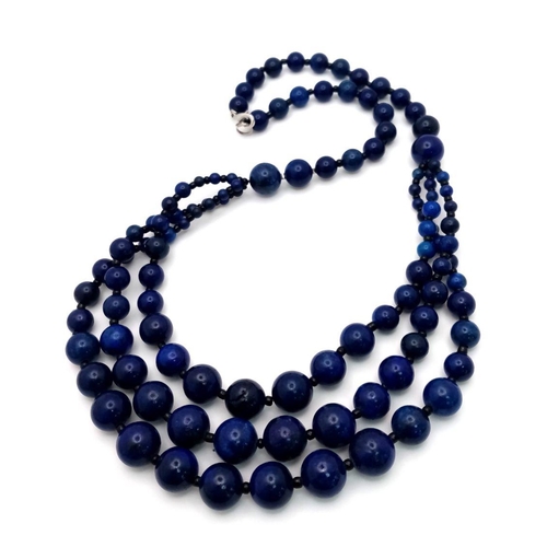 195 - A vintage, three strand necklace and bracelet set with round lapis lazuli beads of graduating size. ... 