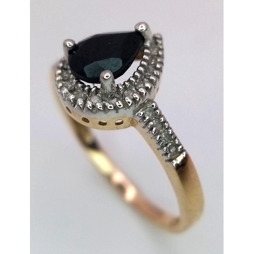 484 - A 9K Yellow Gold Onyx and Small Diamond Ring. Teardrop centre-stone. Size P. 2.2g