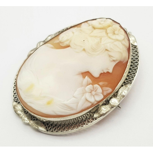 694 - A Silver Bundle including,  Bangle and Cameo Brooch/Pendant. 26.3g total weight. JM25