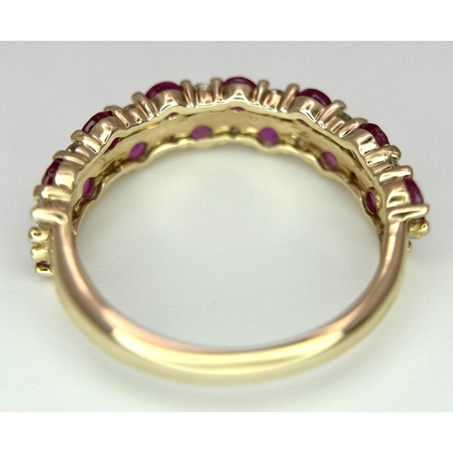 418 - A 9K YELLOW GOLD DIAMOND & RUBY 2 ROW BAND RING 0.20CT 1.56G IN WEIGHT. SIZE I. Ref: 8257.