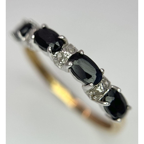 463 - A 9K Yellow Gold Onyx and Diamond Ring. Size P. 1.5g total weight.