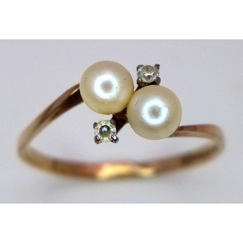 478 - A 9K Yellow Gold Diamond and Pearl Ring. 1.2g total weight. 0.04ct diamond weight. Size O. JM10.