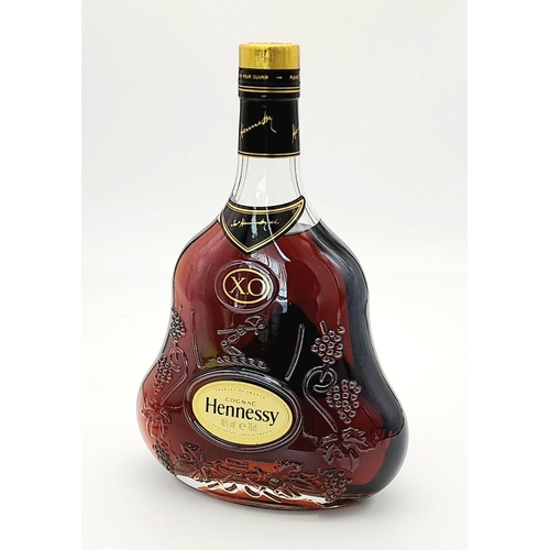 485 - A Hennessy X.O  Cognac Gift Set. Includes a bottle of X.O Hennessy (70cl)- Two branded Cognac Glasse... 