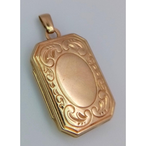 532 - Beautiful vintage 9 carat GOLD LOCKET. Rectangular shape with Scroll decoration border and central C... 