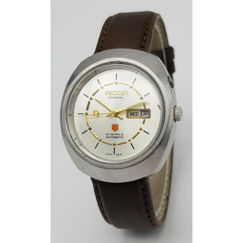 579 - A Vintage Ricoh 21 Jewels Automatic Gents Watch. Brown leather strap. Stainless steel case - 38mm. S... 