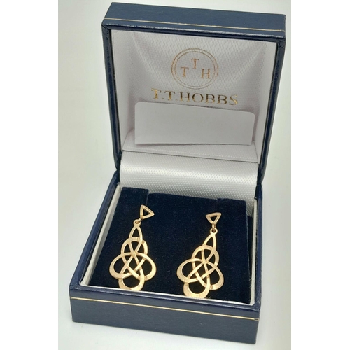 588 - Attractive pair of  9 carat GOLD CELTIC EARRINGS. Drop style with filigree Celtic design. Complete w... 