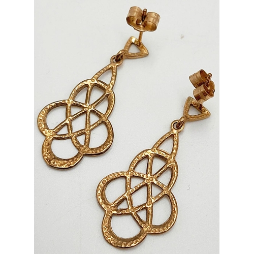 588 - Attractive pair of  9 carat GOLD CELTIC EARRINGS. Drop style with filigree Celtic design. Complete w... 