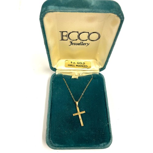 183 - 9ct gold crucifix pendant & chain