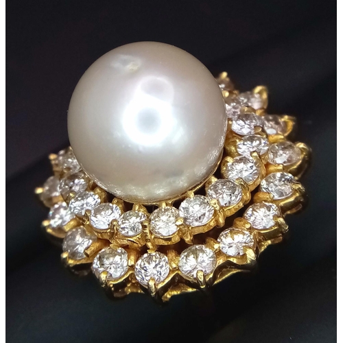 12 - A stunning 18 K yellow gold ring with a large perfectly spherical white natural pearl, 14 mm in diam... 