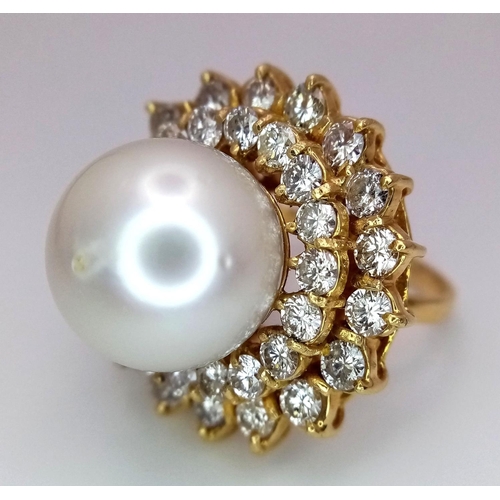 12 - A stunning 18 K yellow gold ring with a large perfectly spherical white natural pearl, 14 mm in diam... 