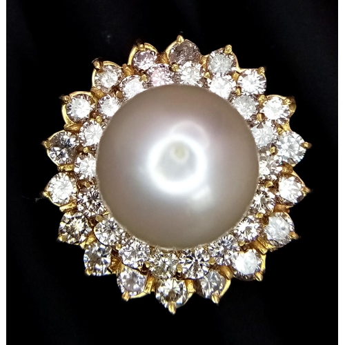 12 - A stunning 18 K yellow gold ring with a large perfectly spherical white natural pearl, 14 mm in diam... 