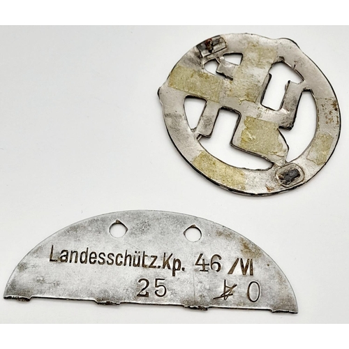 550 - Two Original WW2 German Nazi Pieces Comprising a Nazi Eagle White Metal Badge & A Half German Dog Ta... 