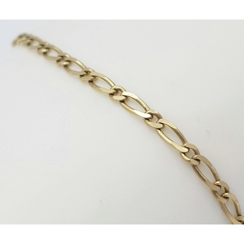 567 - Hallmarked 9 carat Slim GOLD BRACELET.  Similar to Figaro link. 1.4 grams. 18 cm.