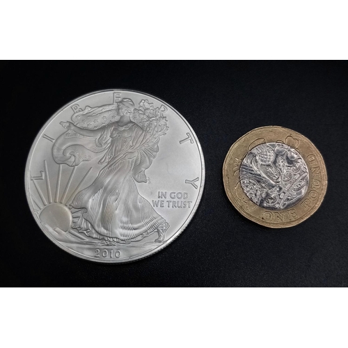 599 - A Mint Condition 2010 American .999 Fine Silver Eagle. Part of ‘The Fabulous 12’ Collection. 31.1 Gr... 